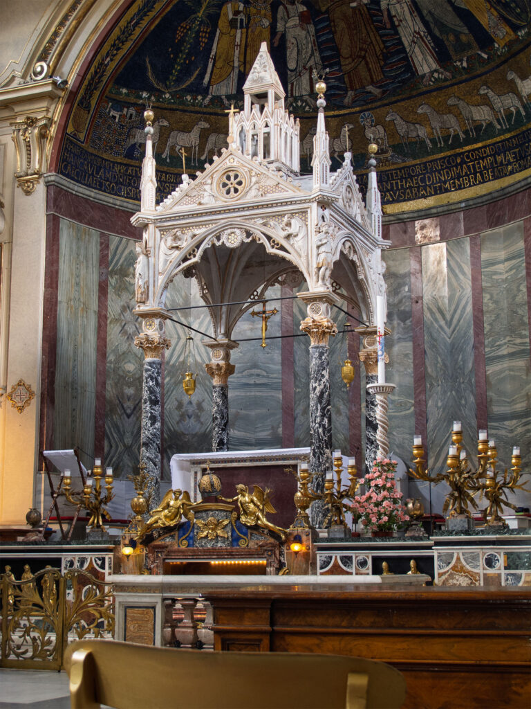 catholic church mass setting with high altar and canopy